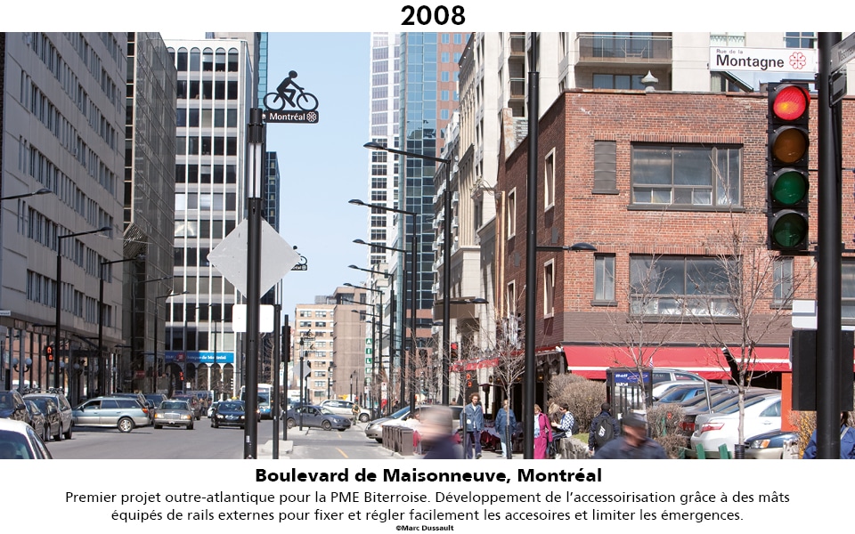 Boulevard de Maisonneuve à Montréal, mâts accessoirisés grâce aux rails techniques